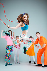 Image showing Group of man, woman and teens dancing hip hop choreography