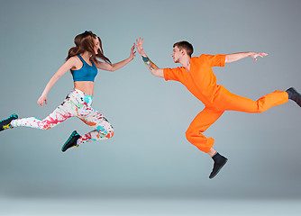 Image showing The man, woman dancing hip hop choreography