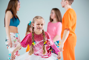 Image showing Group of man, woman and teens dancing hip hop choreography