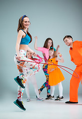 Image showing Group of man, woman and teens dancing hip hop choreography