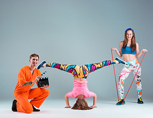 Image showing Group of man, woman and teens dancing hip hop choreography