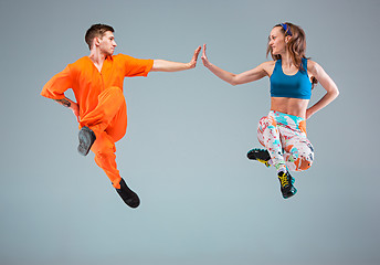 Image showing The man, woman dancing hip hop choreography