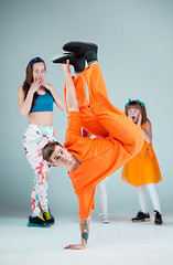 Image showing Group of man, woman and teens dancing hip hop choreography