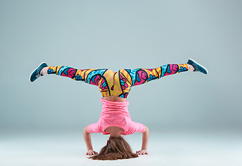 Image showing The teen girl dancing hip hop choreography