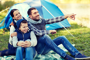 Image showing happy family with tent at camp site