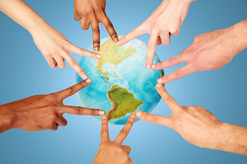 Image showing group of international people showing peace sign