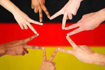 Image showing group of international people showing peace sign