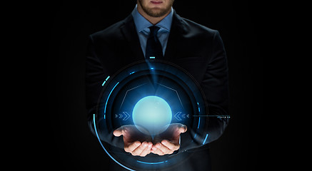 Image showing close up of businessman with virtual projection