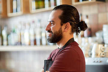 Image showing happy man, barman or waiter at bar