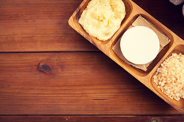 Image showing close up of soap, himalayan salt and body scrub