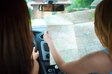 Image showing Two girls traveling in a car