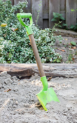 Image showing Little shovel in the sand