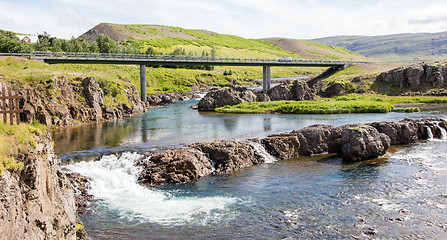 Image showing Bridge over a small river and the car on it