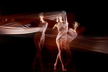 Image showing The sensual and emotional dance of beautiful ballerina