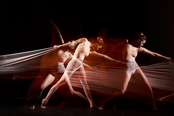 Image showing The sensual and emotional dance of beautiful ballerina