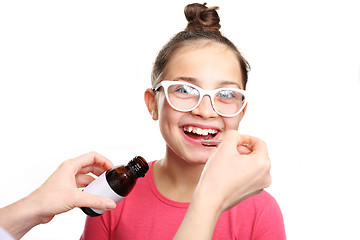 Image showing A child with a doctor, a cure for the flu.