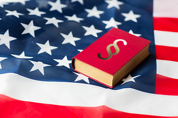 Image showing close up of american flag and lawbook