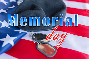 Image showing memorial day over american flag, hat and dog tag