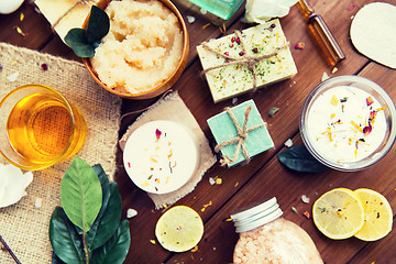 Image showing close up of body care cosmetic products on wood