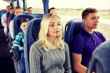 Image showing happy couple or passengers in travel bus