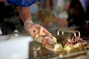 Image showing cook cooking tortilla wraps at street market