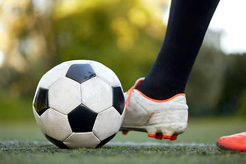 Image showing soccer player playing with ball on football field