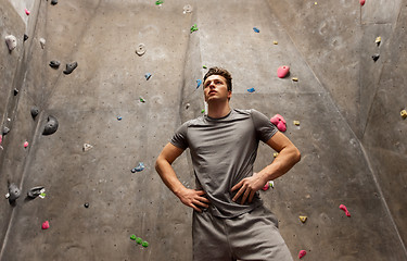 Image showing young man exercising at indoor climbing gym