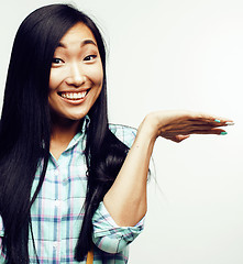 Image showing young pretty asian woman posing cheerful emotional isolated on white background, lifestyle people concept