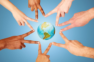 Image showing group of international people showing peace sign