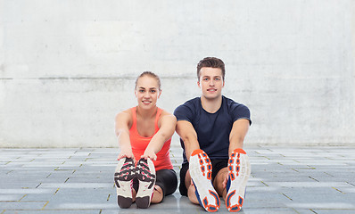 Image showing happy sportive man and woman