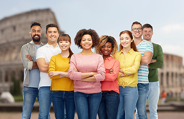 Image showing international group of happy people over coliseum