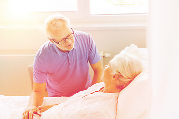 Image showing senior couple meeting at hospital ward