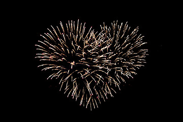 Image showing heart shaped fireworks at night