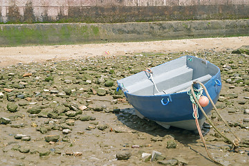 Image showing Tied down boat with low tide in the bay of Cadiz, Andalusia, Spain