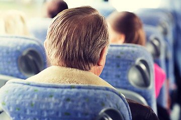 Image showing close up of senior man sitting in travel bus