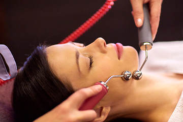 Image showing woman having hydradermie facial treatment in spa