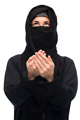 Image showing praying muslim woman in hijab over white