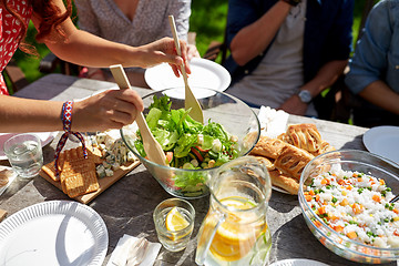 Image showing friends having dinner at summer garden party