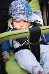 Image showing baby boy sitting in the pram