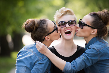 Image showing portrait of three young beautiful woman with sunglasses