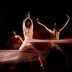 Image showing The sensual and emotional dance of beautiful ballerina