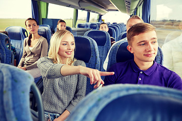 Image showing group of tourists in travel bus