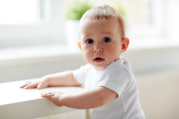 Image showing happy little baby boy or girl at home