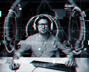 Image showing man in headset with computer virtual projections