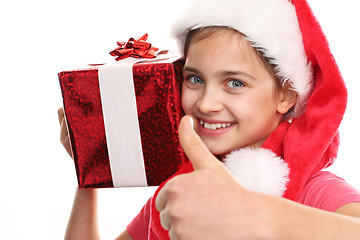 Image showing Christmas gifts, joy child We make dreams come true. Happy child with Christmas gift.