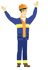 Image showing Constructor standing with raised arms up.