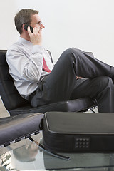 Image showing Businessman talking on cell phone