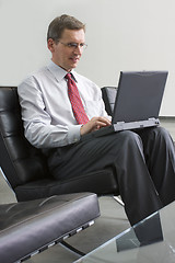 Image showing Businessman working with laptop computer