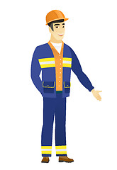 Image showing Asian builder with hand in his pocket.