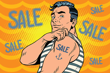 Image showing Sailor with sale tattoo on hand
